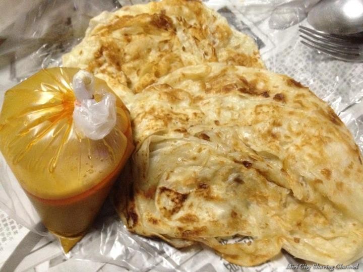 Roti Canai Kosong at RM1 per piece with kuah sauce