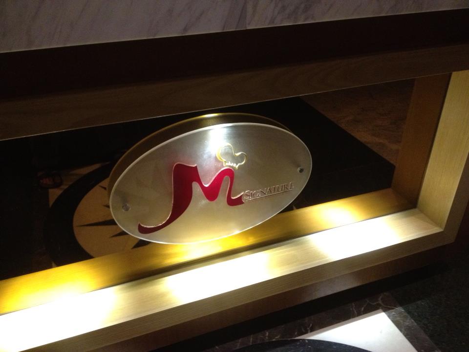 M Signature Revolving Restaurant logo